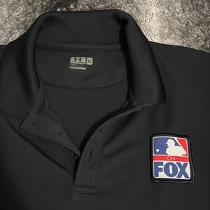 Underarmour. Fox baseball. Polo shirt. Never worn. Size XL.